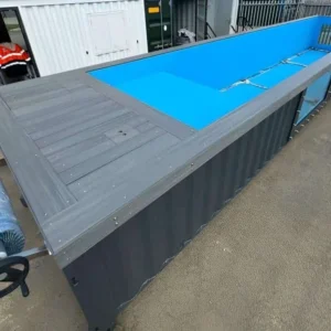 # 12M / 40ft Portable Container Swimming Pool | Ideal Outdoor Swimming Pool Transform your outdoor space with the **12M / 40ft Portable Container Swimming Pool** from **Zenarosa Shipping Containers**. Expertly engineered from a premium **40ft shipping container**, this modern **container swimming pool** offers the perfect combination of luxury, durability, and convenience. Whether you're enhancing your home, hotel, resort, holiday rental, fitness center, or commercial property, this stylish outdoor pool provides a cost-effective alternative to traditional in-ground swimming pools while delivering exceptional performance and contemporary design. Constructed from **high-strength Cor-Ten weathering steel**, this **40ft portable container pool** is built to withstand harsh weather conditions and provide years of reliable use. The reinforced steel structure ensures maximum strength and stability, while the waterproof interior lining and premium filtration system help maintain crystal-clear water with minimal maintenance. Designed for quick installation, the **12-meter container swimming pool** arrives largely pre-assembled, significantly reducing installation time and eliminating the extensive excavation required for conventional pools. Simply prepare a suitable level foundation, connect the utilities, and your pool is ready for use. Its portable design also allows for relocation if your property layout or business needs change. The spacious 40ft design provides ample room for swimming, exercise, relaxation, and family fun. Optional upgrades include tempered glass viewing panels, timber or composite decking, LED underwater lighting, stainless steel ladders, heating systems, spa jets, automatic filtration, pool covers, and custom exterior finishes. The container can also be painted in any **RAL color** to complement your home or commercial branding. ### Key Features * Premium **12M (40ft) portable container swimming pool** * Built from heavy-duty Cor-Ten weathering steel * Modern and stylish outdoor swimming pool design * Durable waterproof interior lining * High-performance filtration and circulation system * Quick installation with minimal site preparation * Portable and relocatable design * Weatherproof and corrosion-resistant construction * Optional tempered glass viewing window * Optional heating, LED lighting, spa jets, and pool cover * Custom RAL colors and exterior finishes available * Ideal for homes, hotels, resorts, villas, gyms, holiday rentals, schools, and commercial properties The **40ft Container Swimming Pool** is perfect for homeowners seeking a luxurious backyard pool, hospitality businesses looking to attract guests, fitness centers requiring lap pools, and property developers wanting an eye-catching feature. Its modular design delivers premium quality without the high costs and lengthy construction process of traditional concrete pools. At **Zenarosa Shipping Containers**, we specialize in manufacturing innovative **container swimming pools**, **portable swimming pools**, **luxury container pools**, and custom shipping container conversions. Every pool is built with precision engineering, premium materials, and strict quality control to ensure outstanding durability, safety, and customer satisfaction. Contact **Zenarosa Shipping Containers** today to request a free quote for the **12M / 40ft Portable Container Swimming Pool**. We offer competitive pricing, worldwide delivery, and fully customized solutions to help you create the perfect outdoor swimming pool for your residential or commercial property.